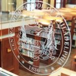 Central logo etched in glass