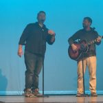 Mr. Wenger and Zak performing
